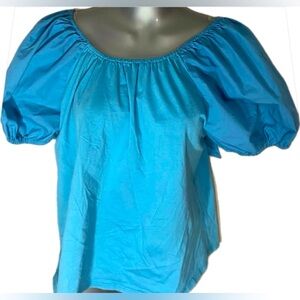 Puffy sleeve tie in back blouse. Size Jr. Large. 100% Cotton.